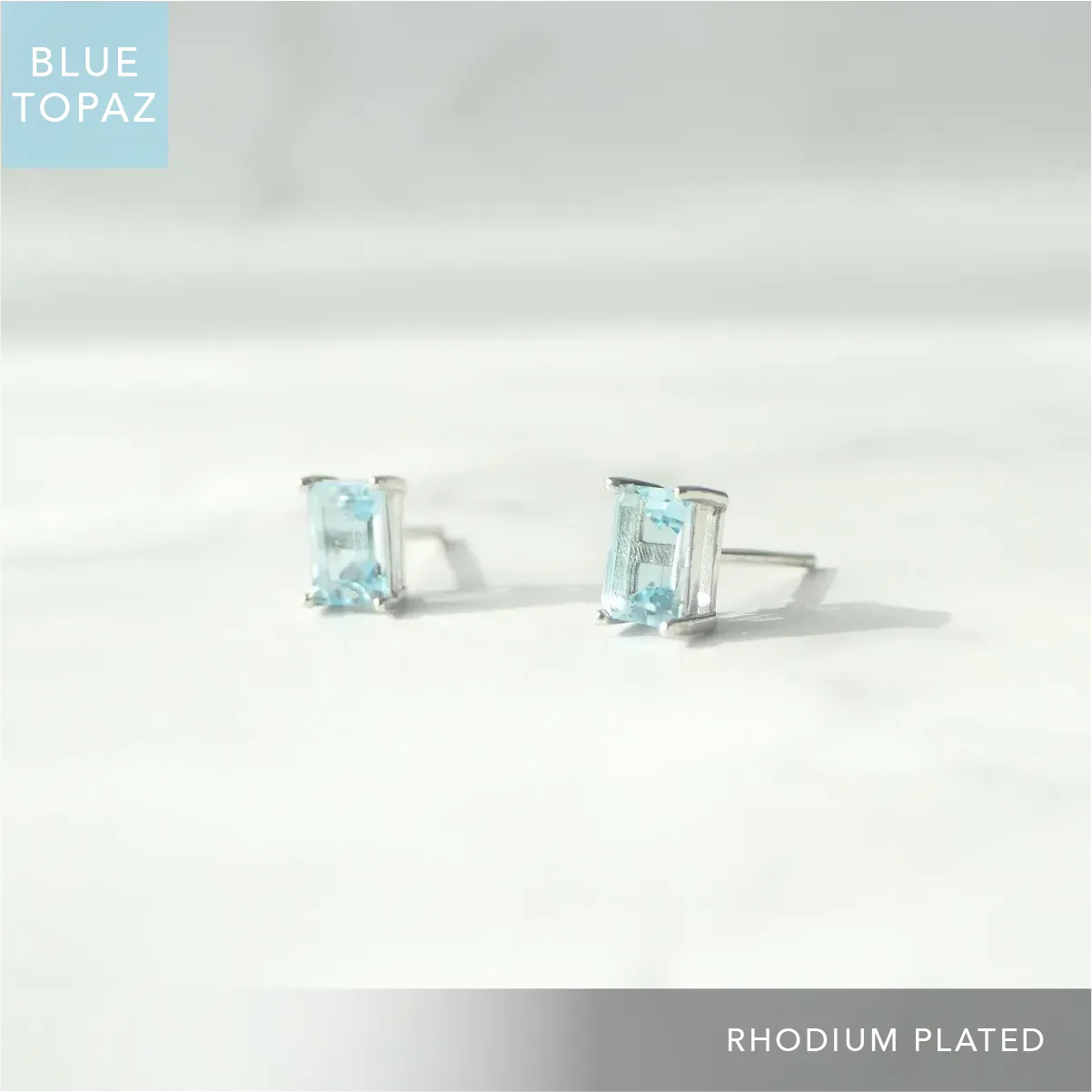 ブルートパーズ 多面カット レクタングル スタッドピアス（シルバー925