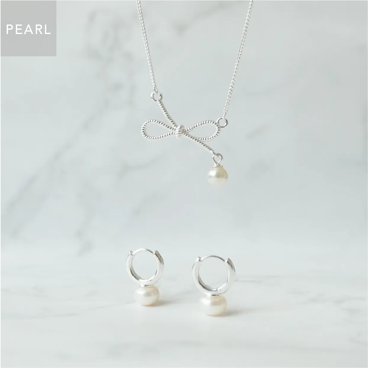 リボン×パール ペンダントネックレス（シルバー925）、ハギーピアス、6月誕生石、蟹座・魚座・牡牛座、金属アレルギー対応